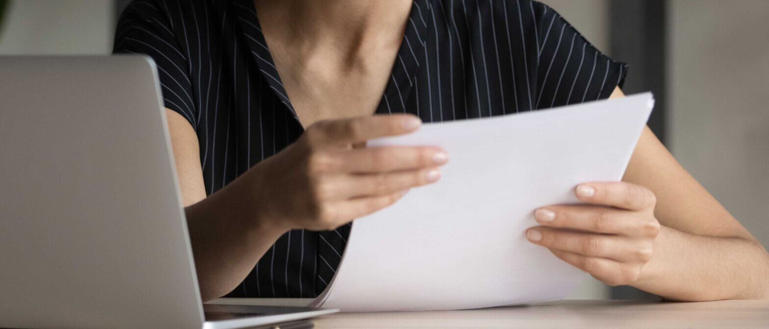Person reading a notice of furlough