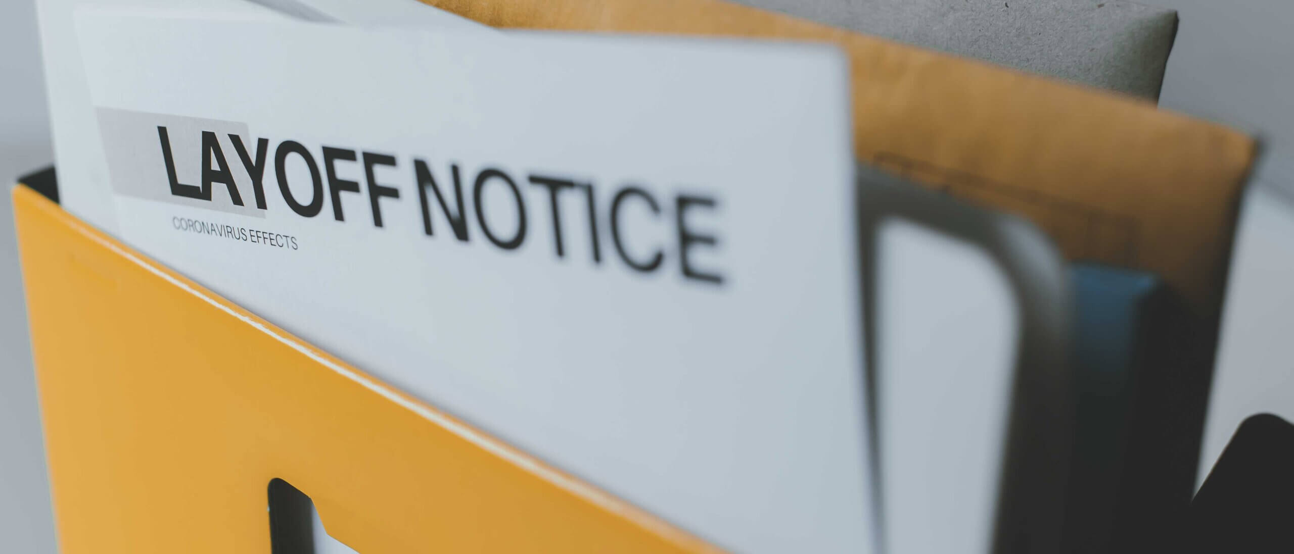Layoff notice letter sitting in mailbox