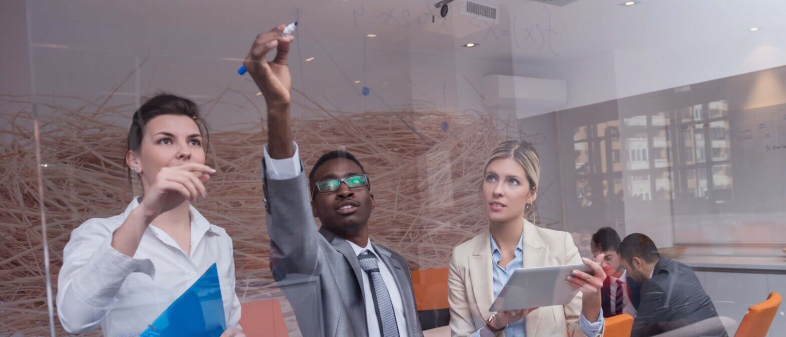 Brokers or Business people in an office
