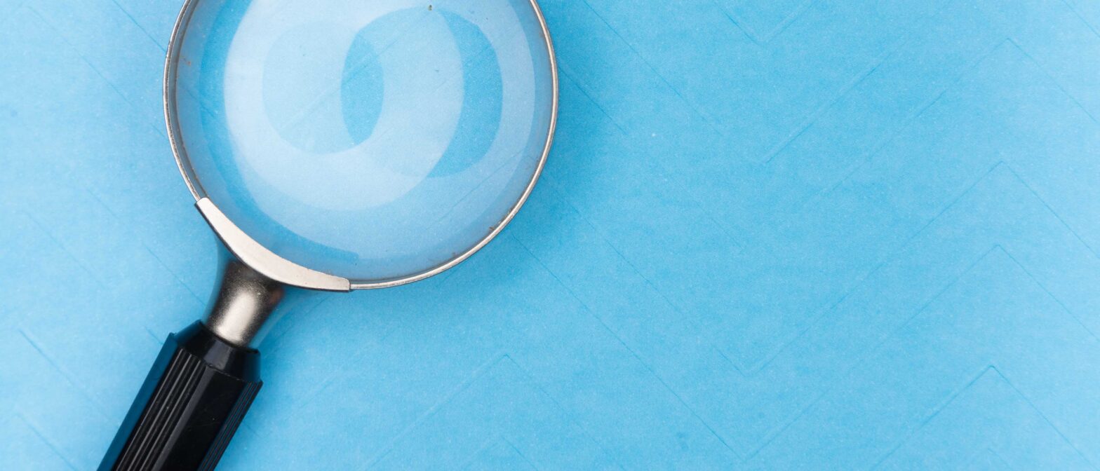 Search lens on blue background