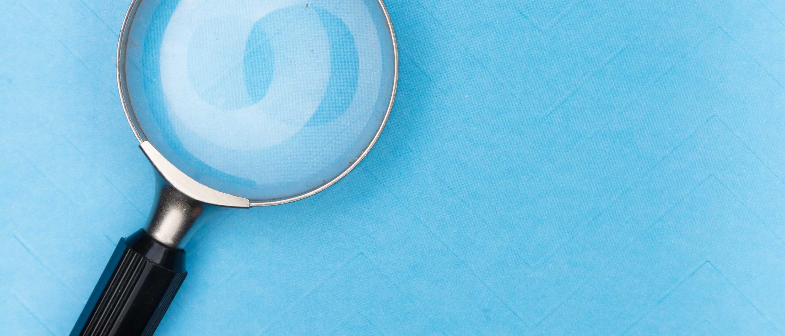 Search lens on blue background