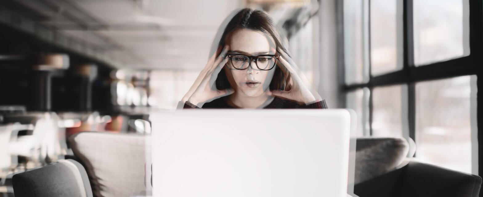 Upset Remote Worker at her computer