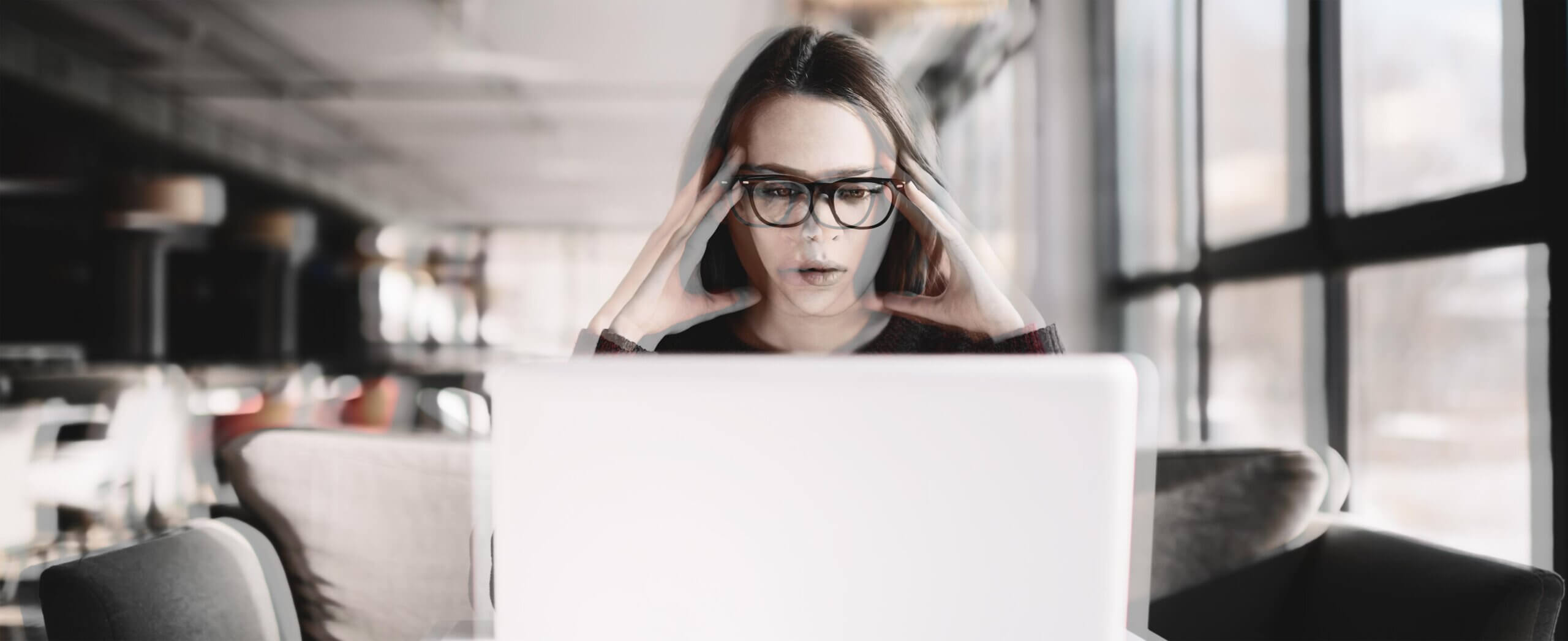 Upset Remote Worker at her computer