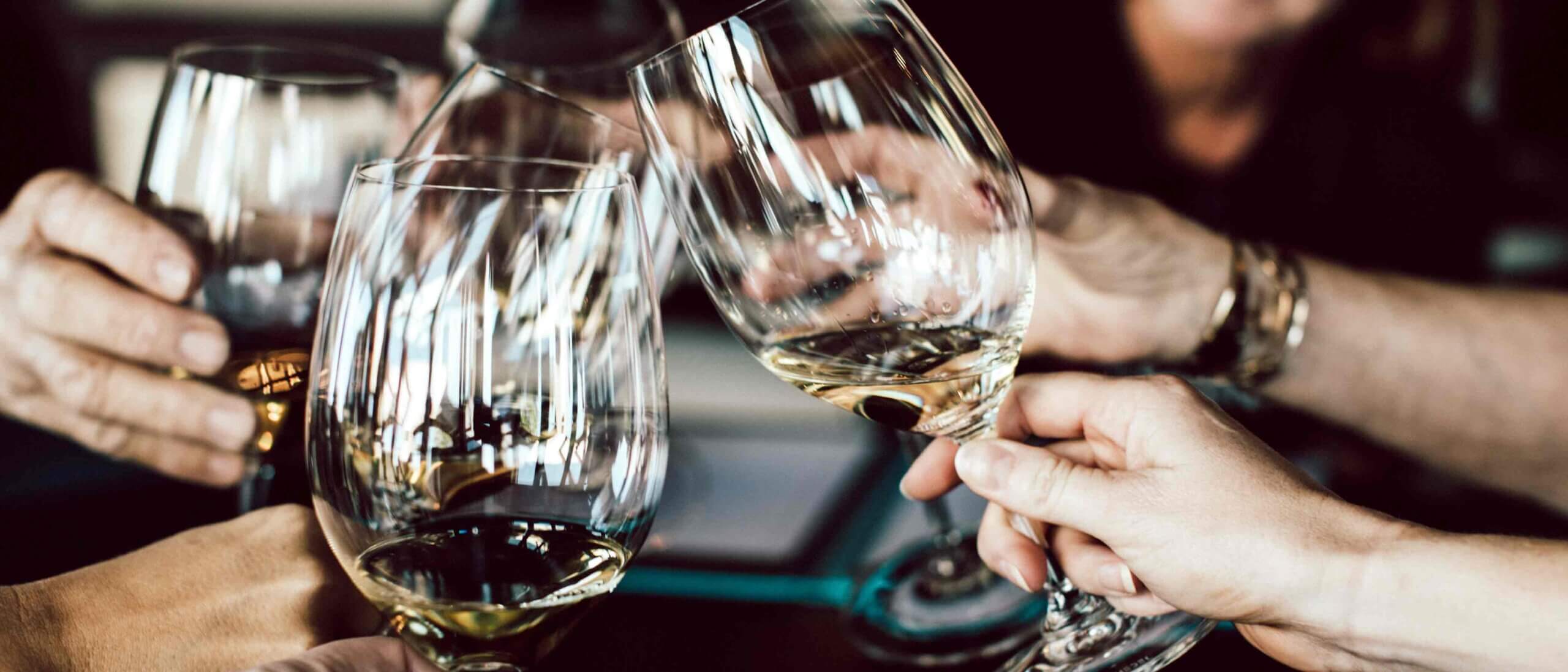 Wine glasses in a toast