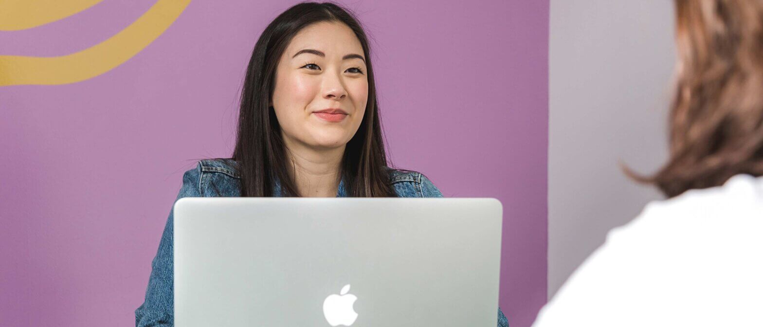 Woman conducts a one-on-one meeting