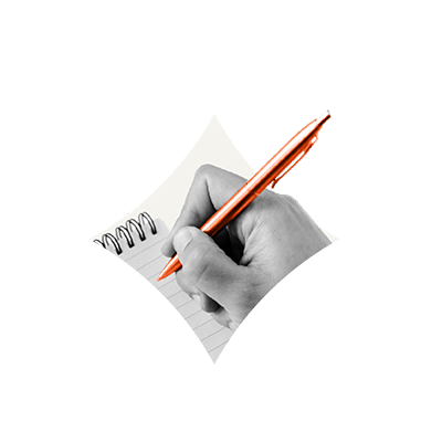 photo of hand holding a pen to paper