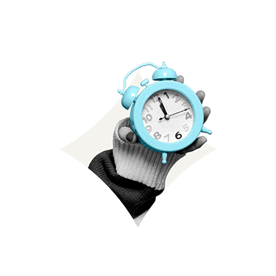 photo of a hand holding a clock